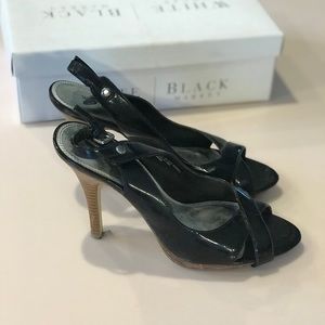 Black sling back open toe heels